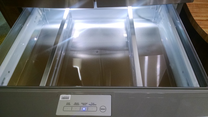 Middle refrigerated drawer has dividers that can come out.