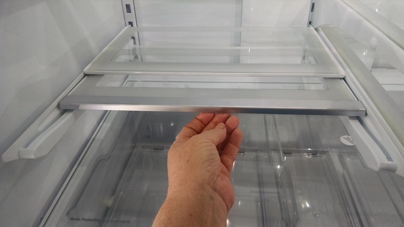 You slide it down and back.