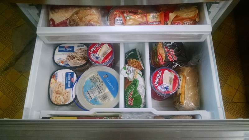 bottom freezer with food.