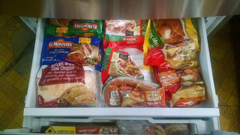 Middle Freezer slider drawer with food.