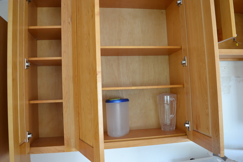 Kitchen main cabinets upper north of stove