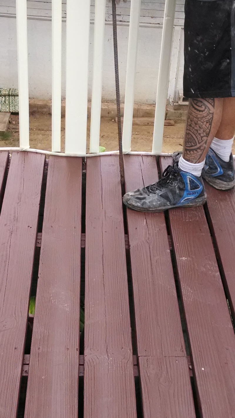 SW pillar adding rebar to the grout.