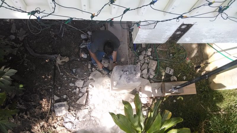 SW pillar. Cement dust flying as cutting happens.