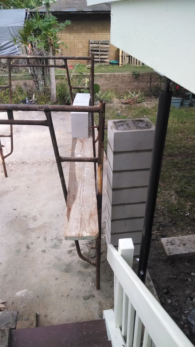 NW pillar. Partially finished post. Filled with grout.