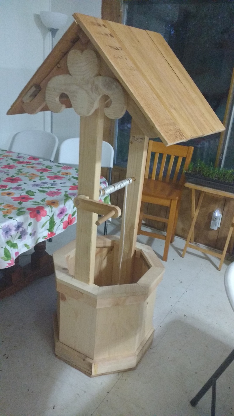 Joseph bought a 4.5 foot Wishing Well at an auction for Rosewold.