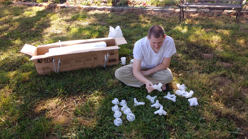 Isaac sorts the plastic couplings