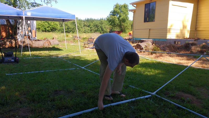 Isaac working on the frame