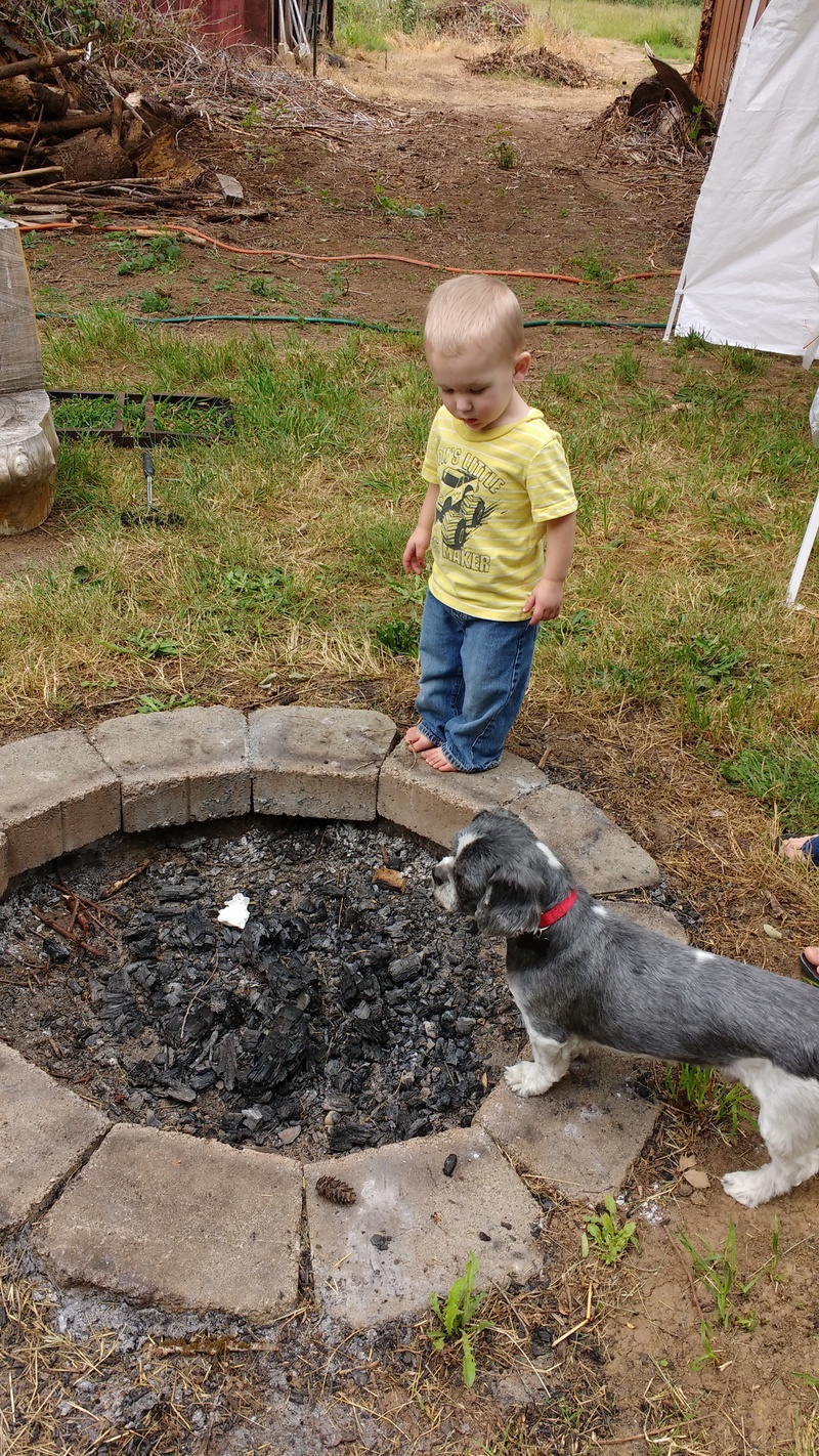 Austin and Rocky at the fire pit.