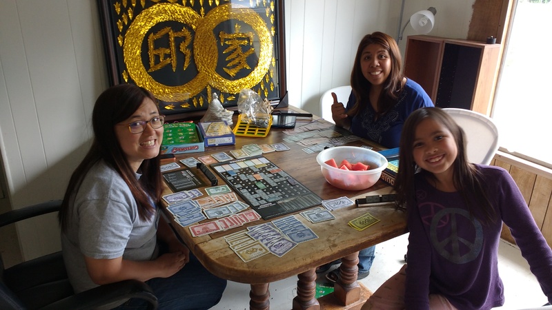 Acquire, being played by Jean, Ann, and Eva.