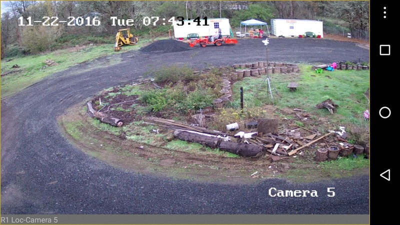 Don had a load of gravel brought in and Goldie, the tractor, is helping Don fill chuckholes.