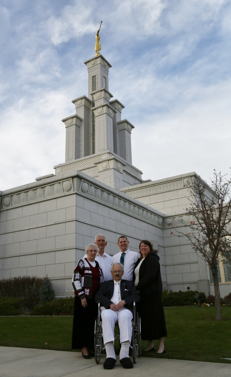 Isaac, his parents, and one set of grandparents.