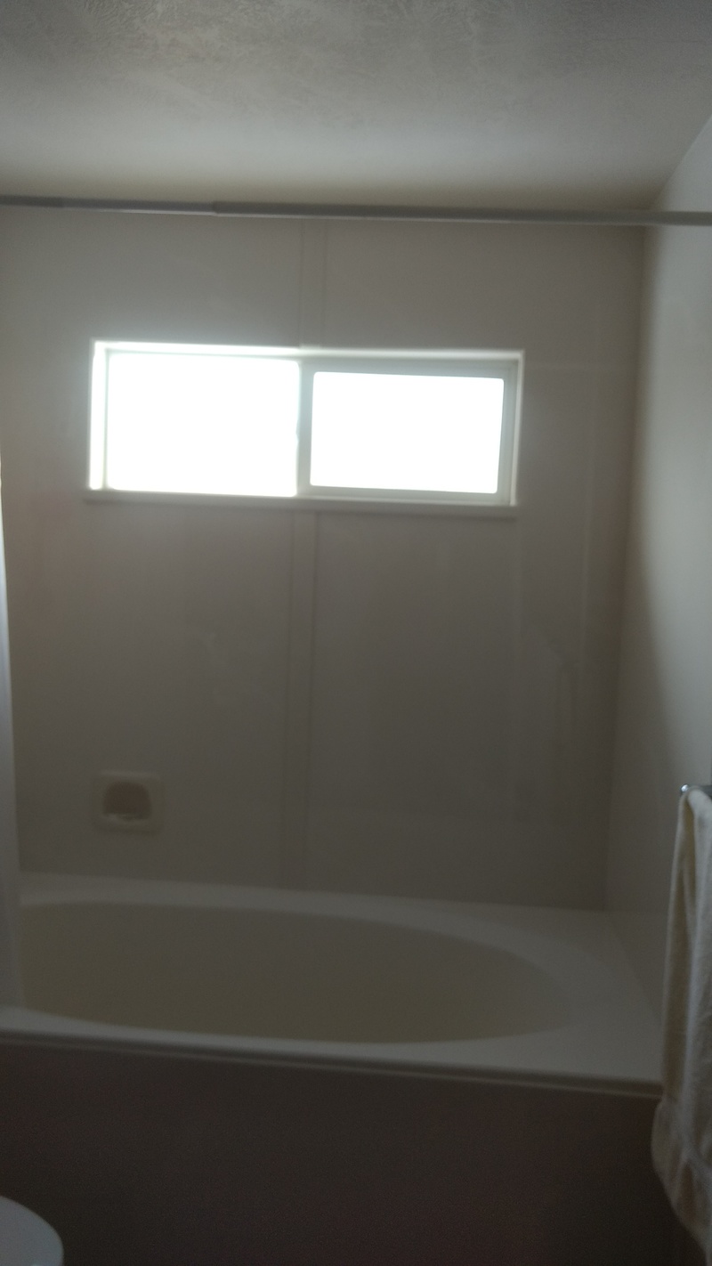 Lois taking inspiration from Laura's shower tub with window.