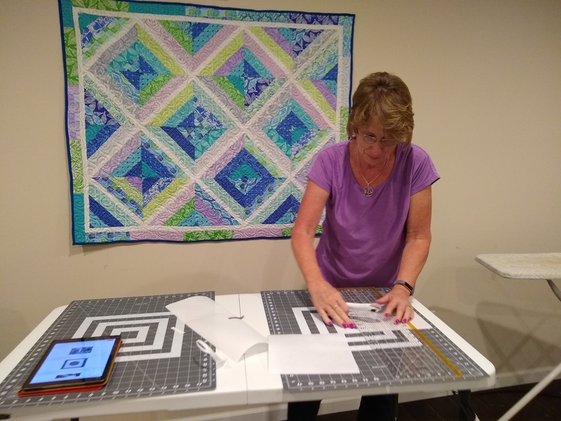 Sally working on her quilt.