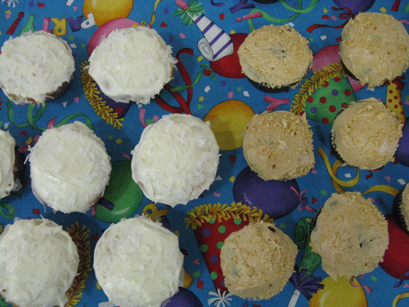 We had two kinds of birthday cupcakes. Coconut and Peanut Butter. Each was served with Vanilla Ice Cream.