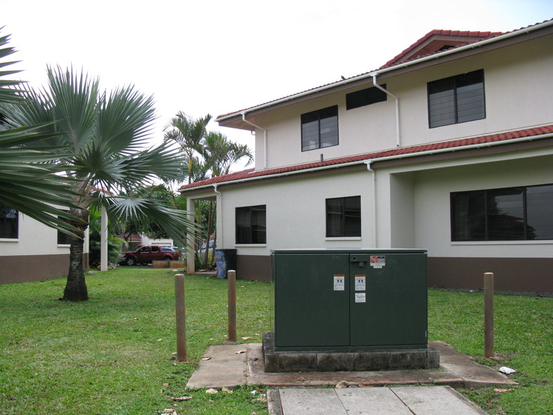 Green space between 10A and 9C. Electrical box.