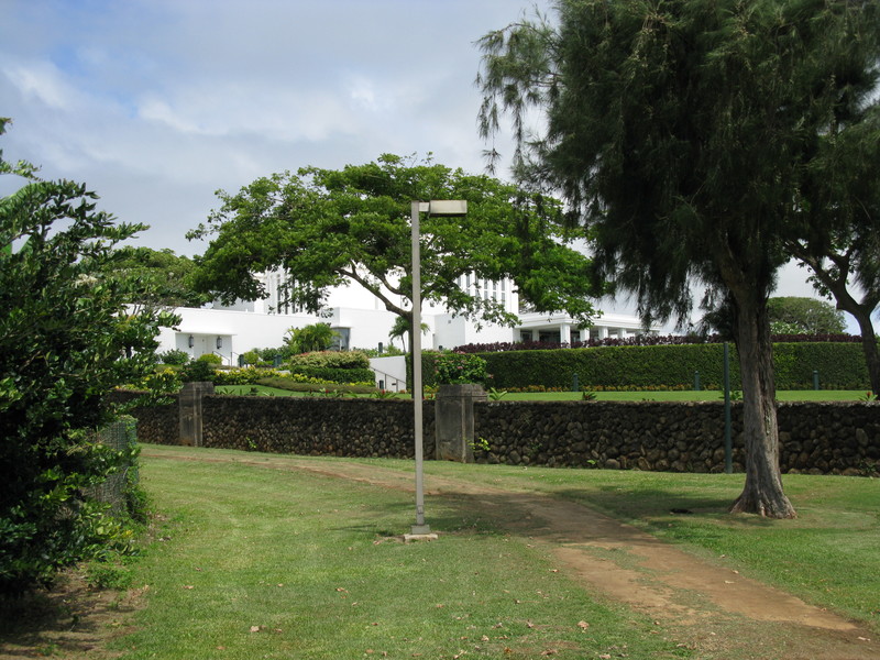 At the end of the sidewalk, looking towards the temple. That's the way I would go to the temple if I lived in 10A, except at night they lock the gate so you'd have to walk around.