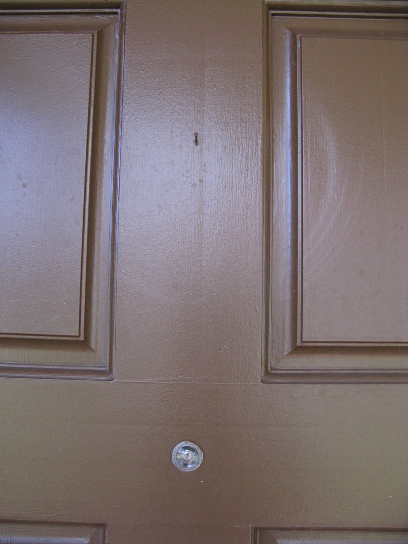 Nail on the front door for hanging something cute? :-) And peek hole.