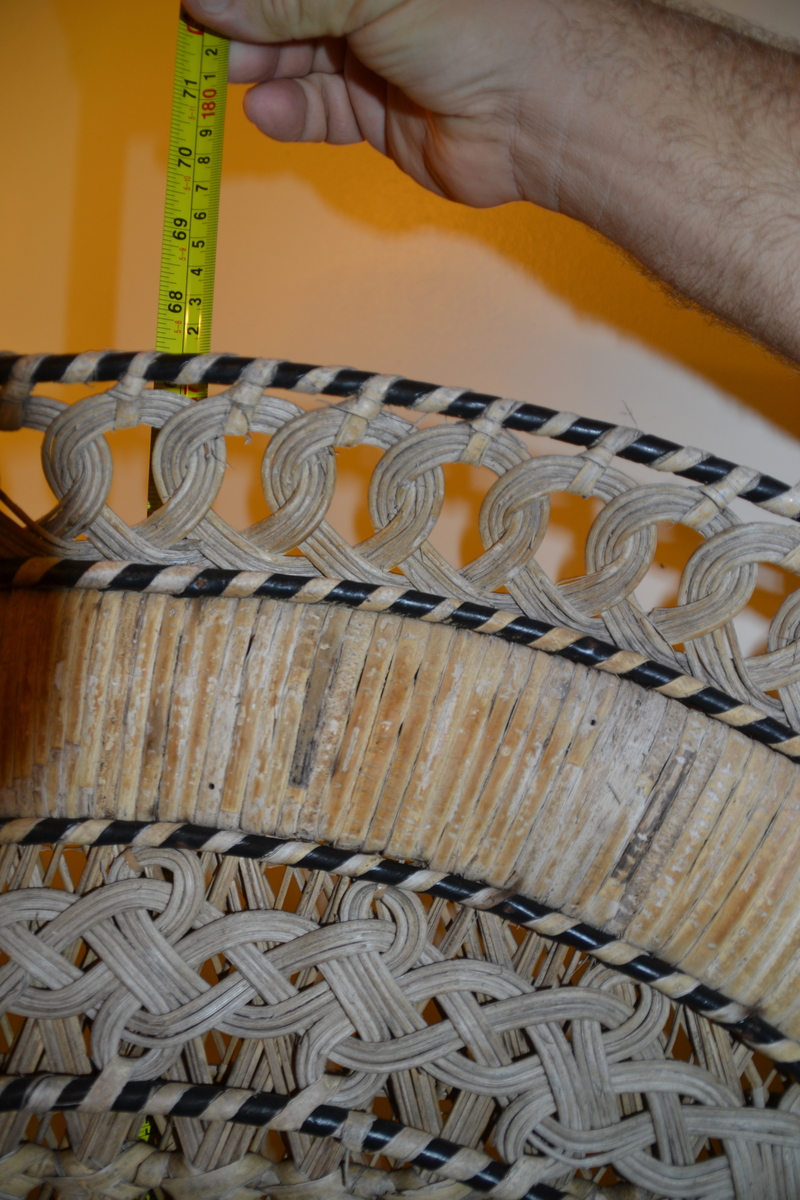 It is 67.5 inches tall. That is a little more than 5 and a half feet tall.