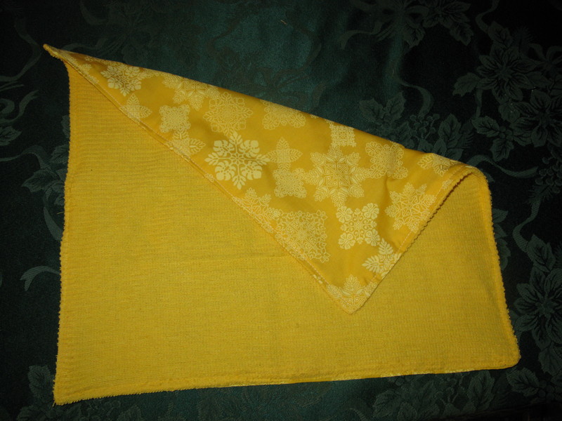 Inside the bag, besides the nursing cover, you put the diapers, wipes, pads, and the ever popular burp cloth. :-)