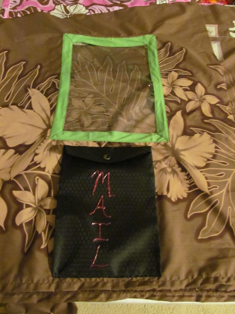 The left front window with the mailbox attached. Their going to get mail. :-)