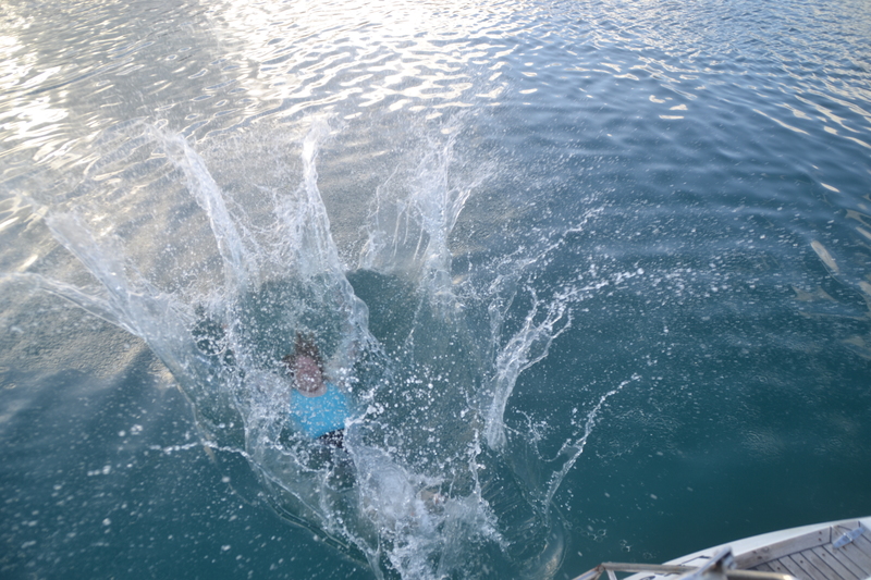 Lois enters the water.